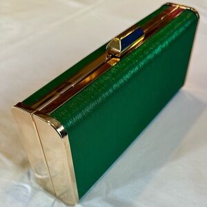 True Decadence/asos rectangle clutch in bright green with golden hardware.